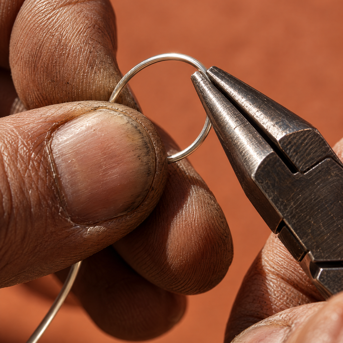 Silversmith bending sterling silver wire with pliers — handmade in Istanbul's Grand Bazaar