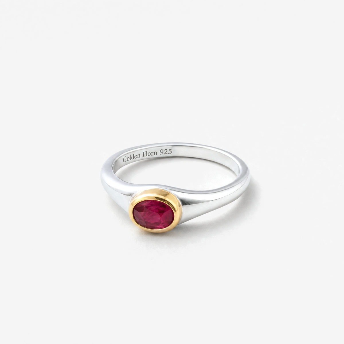 July Ruby Birthstone Ring lying flat, ruby in raised gold bezel - Golden Horn Jewellery