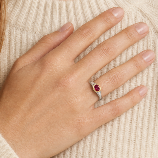 July Ruby Birthstone Ring close-up on hand, flat rose-cut ruby in gold bezel - Golden Horn Jewellery