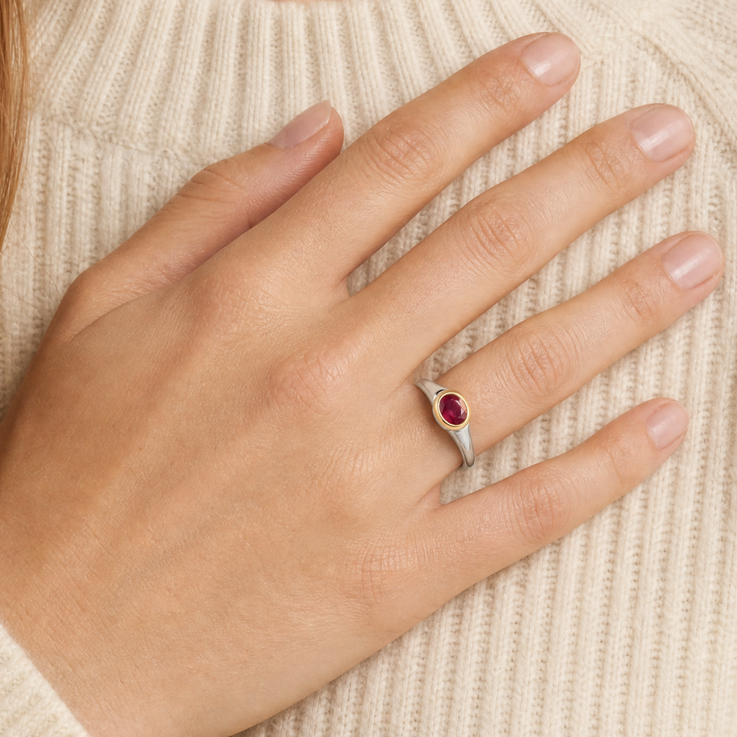 July Ruby Birthstone Ring close-up on hand, flat rose-cut ruby in gold bezel - Golden Horn Jewellery