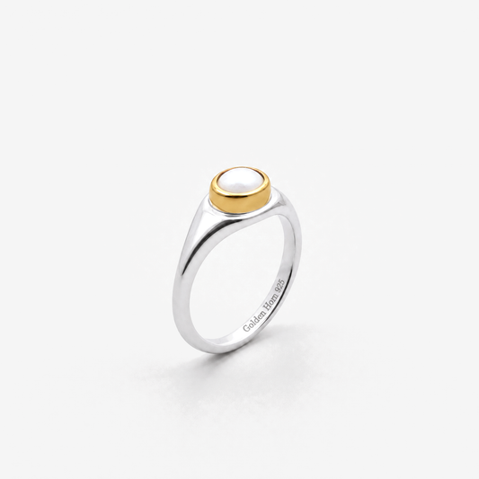 June Pearl Birthstone Ring in sterling silver with gold bezel, three-quarter view - Golden Horn Jewellery