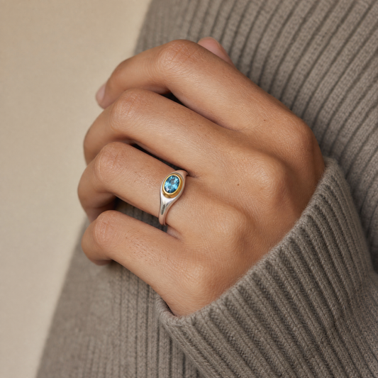 March Aquamarine Birthstone Ring close-up on hand, aquamarine in gold bezel - Golden Horn Jewellery