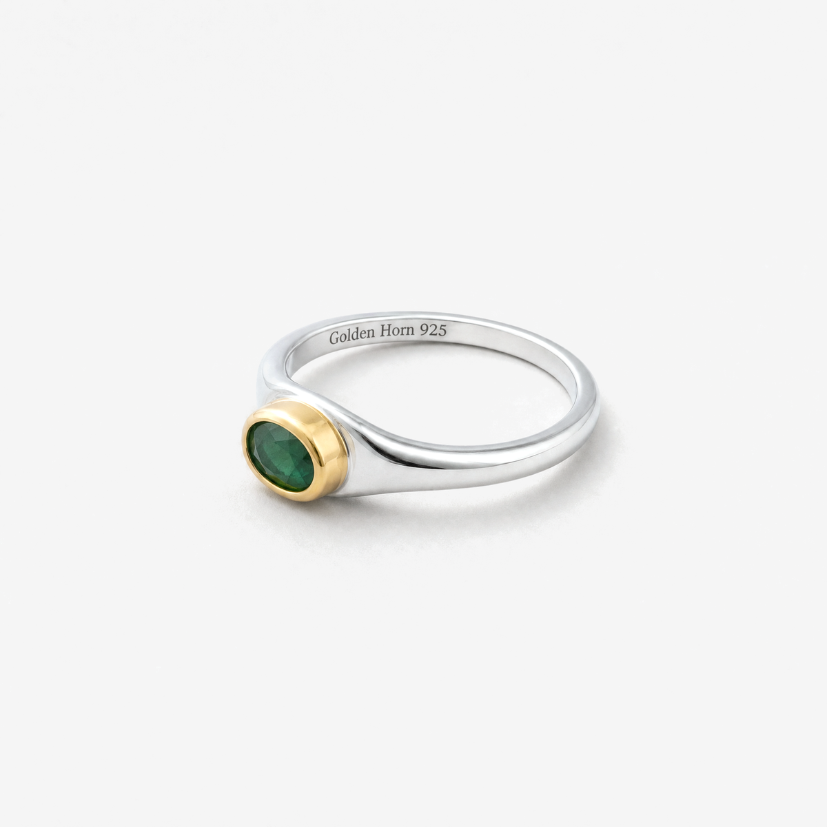 May Emerald Birthstone Ring lying flat, emerald in raised gold bezel - Golden Horn Jewellery