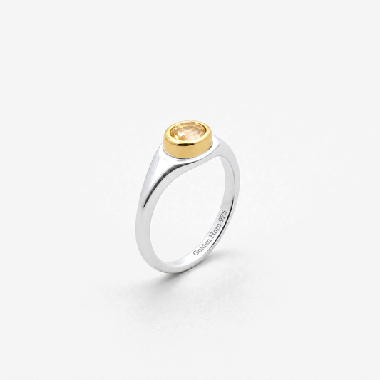 November Topaz Birthstone Ring in sterling silver with gold bezel, three-quarter view - Golden Horn Jewellery