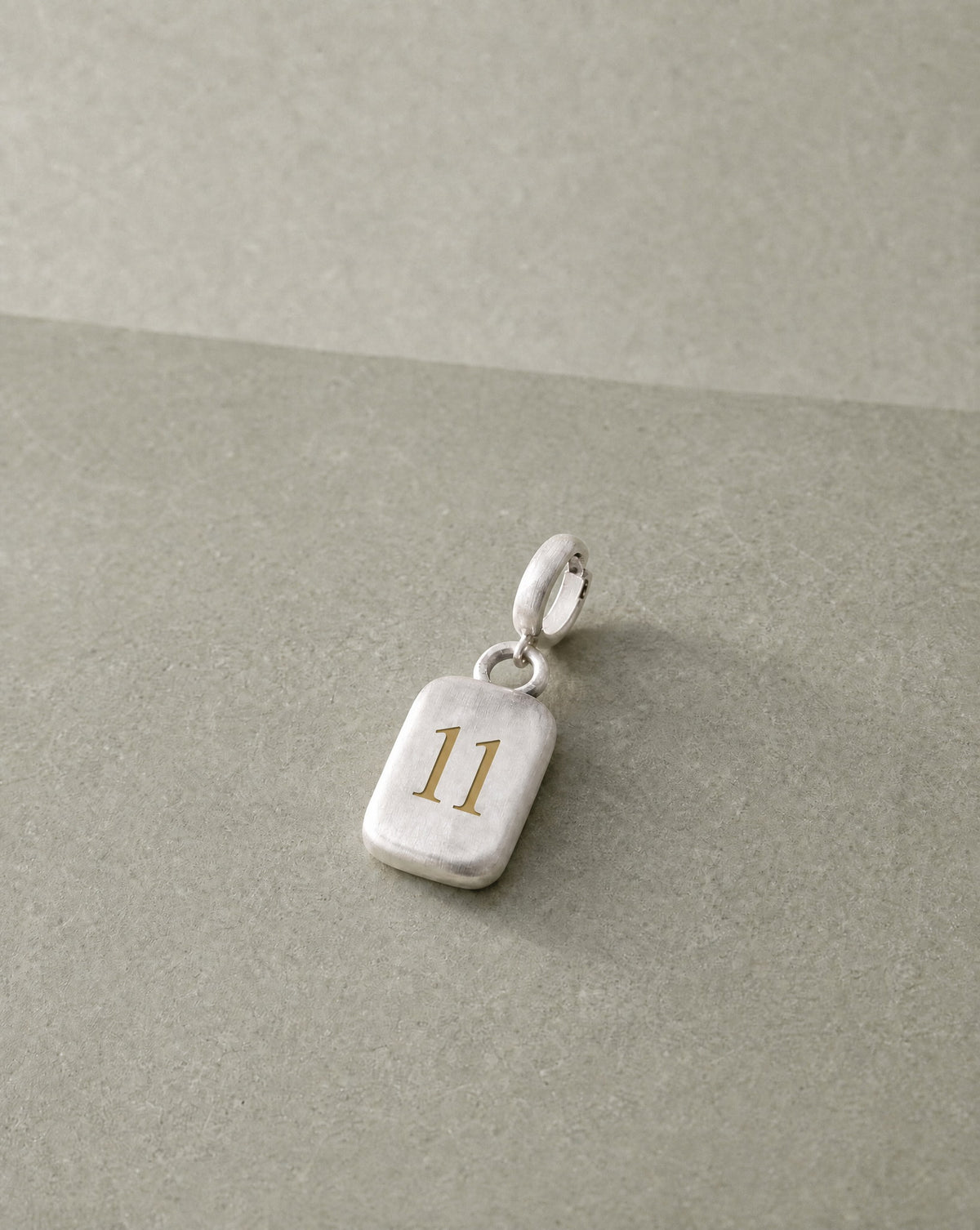 Number 11 Numerology Pendant still life – Golden Horn Jewellery