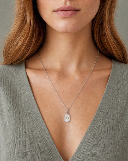 Number 33 Numerology Pendant worn, close-up – Golden Horn Jewellery