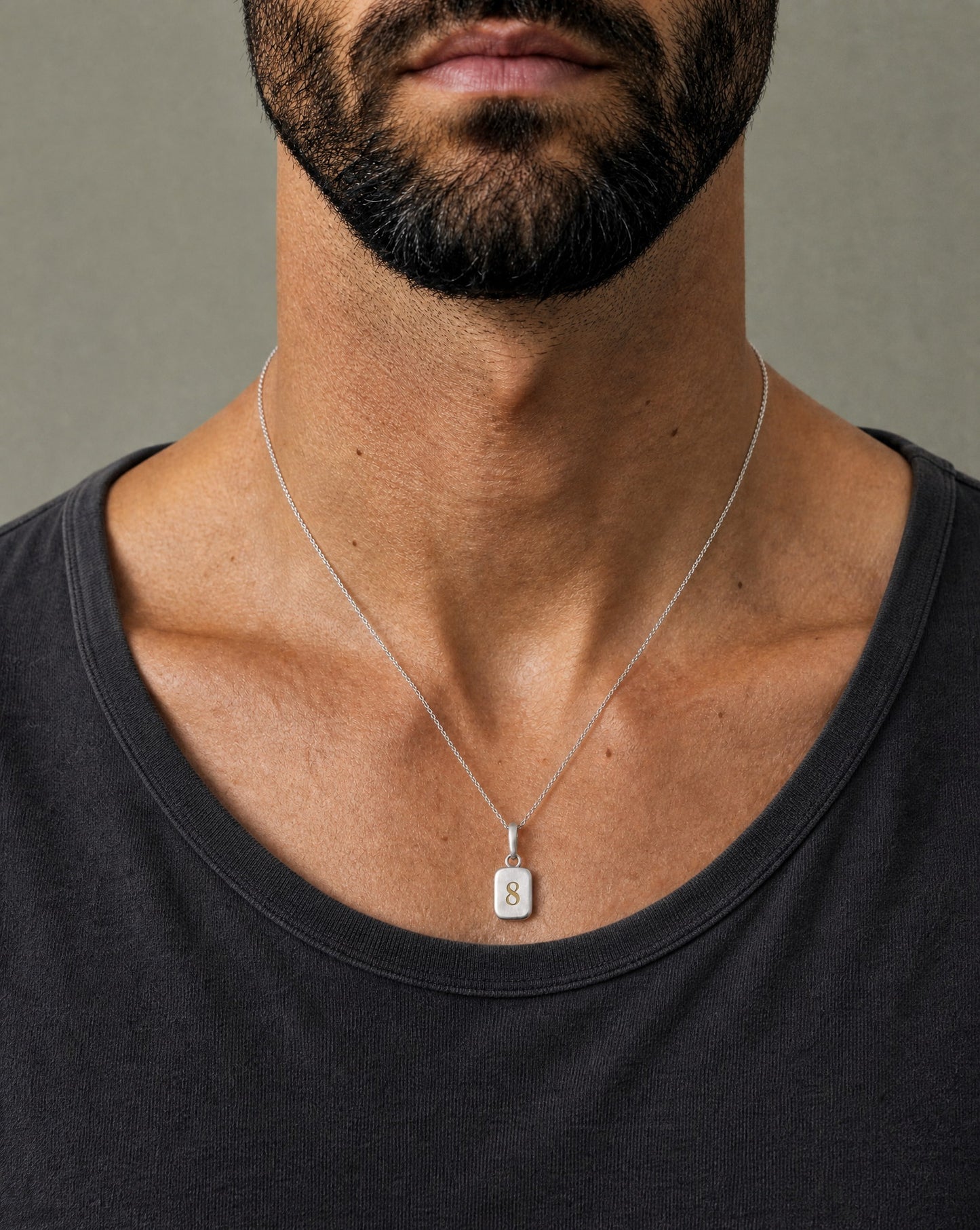 Number 8 Numerology Pendant worn, close-up – Golden Horn Jewellery
