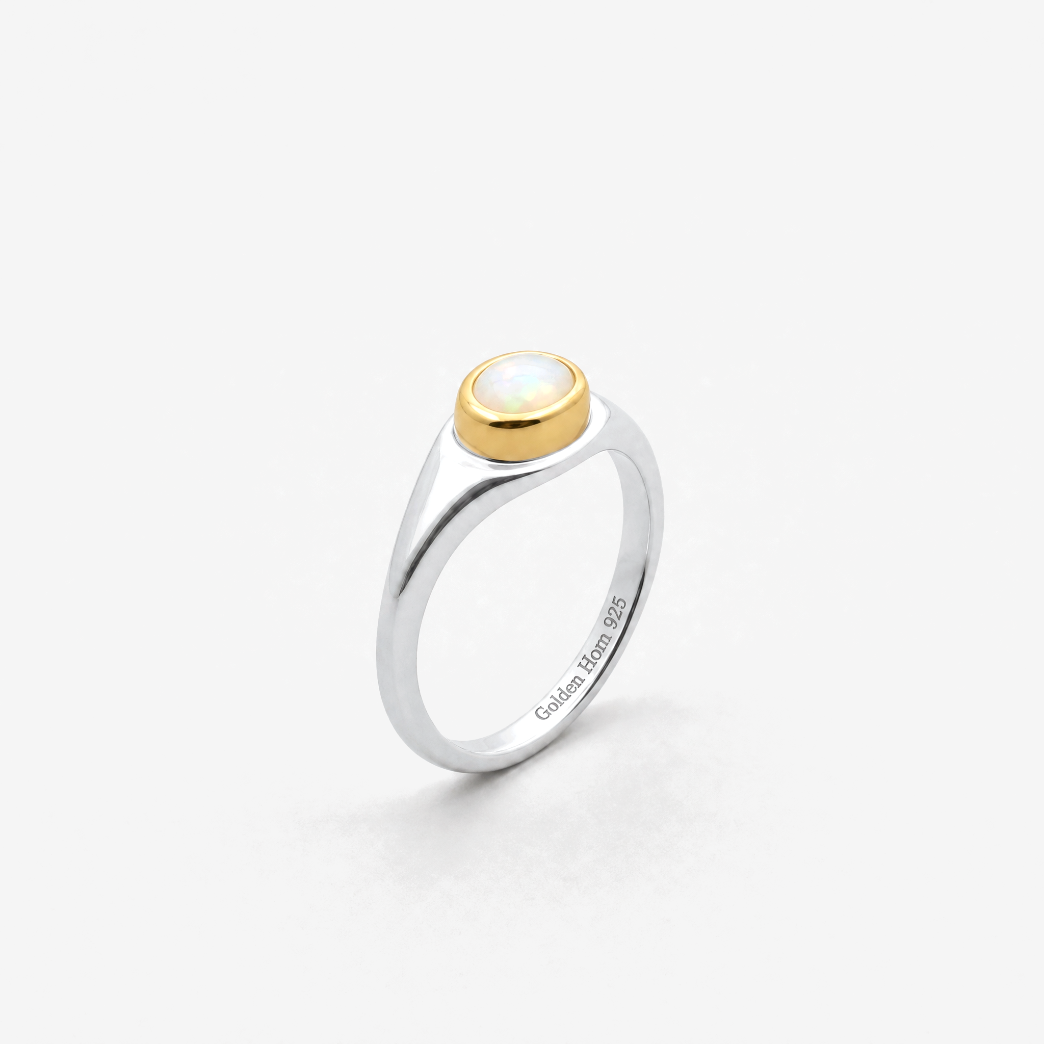October Opal Birthstone Ring in sterling silver with gold bezel, three-quarter view - Golden Horn Jewellery