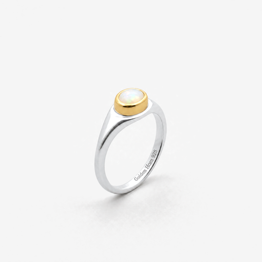 October Opal Birthstone Ring in sterling silver with gold bezel, three-quarter view - Golden Horn Jewellery