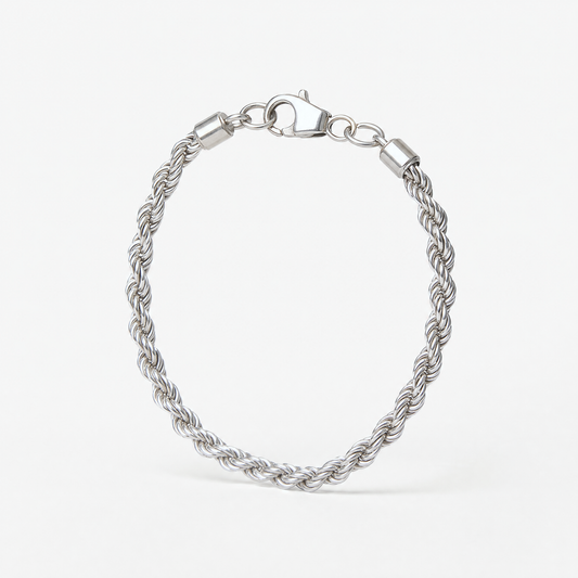 Silver Rope Chain Bracelet standing upright, showing the thick twisted rope links and lobster clasp – Golden Horn Jewellery