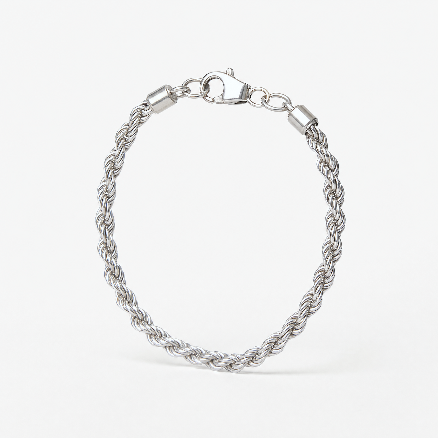 Silver Rope Chain Bracelet standing upright, showing the thick twisted rope links and lobster clasp – Golden Horn Jewellery