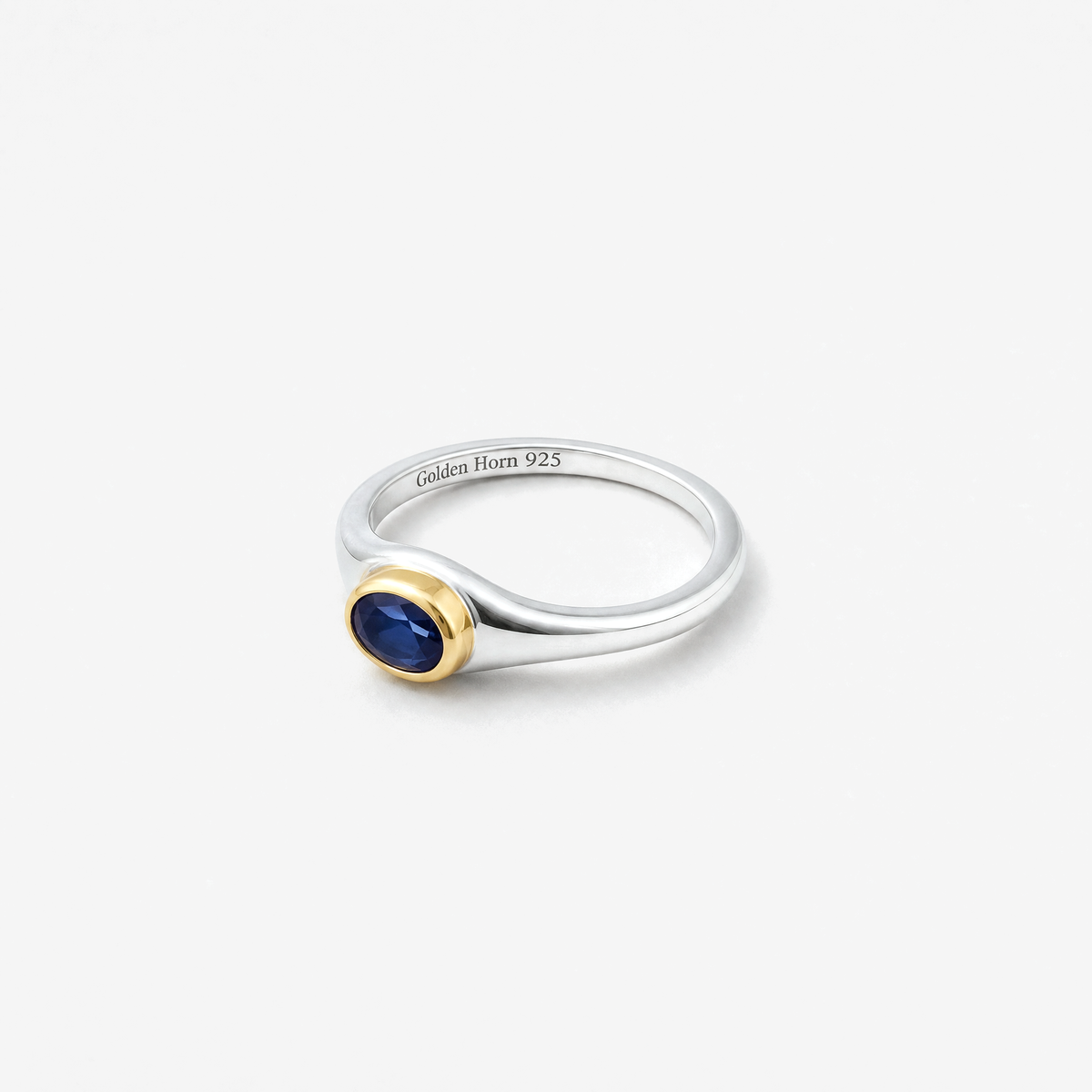 September Sapphire Birthstone Ring lying flat, sapphire in raised gold bezel - Golden Horn Jewellery