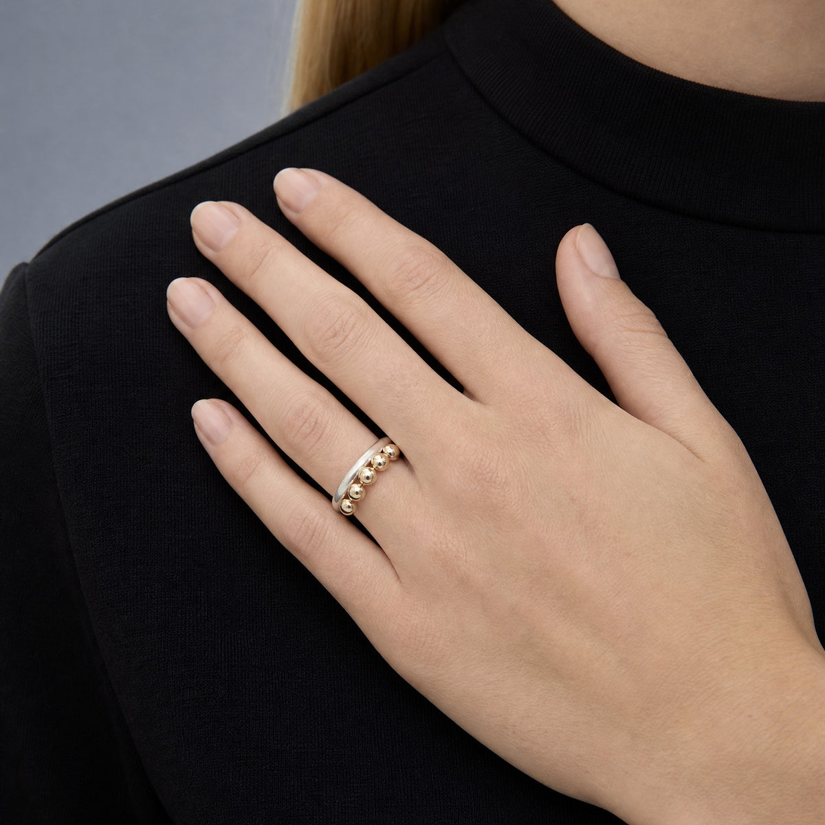 Multi Bubble Dot Circle Stacking Silver Ring close-up on hand, top view – Golden Horn Jewellery