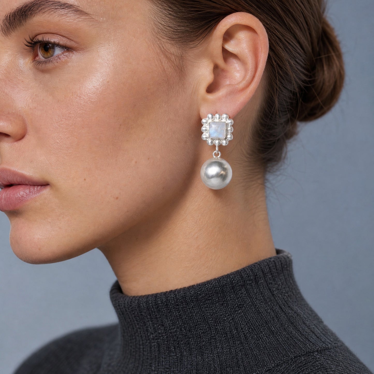 Soap And Bubble Moonstone Silver Earrings close-up on model – Golden Horn Jewellery