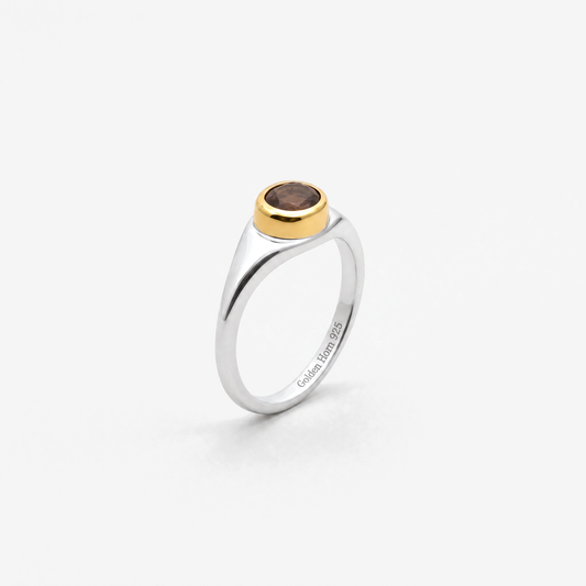 April Brown Diamond Birthstone Ring in sterling silver with gold bezel, three-quarter view - Golden Horn Jewellery