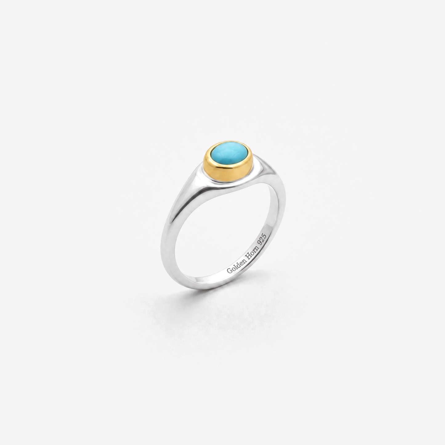 December Turquoise Birthstone Ring in sterling silver with gold bezel, three-quarter view - Golden Horn Jewellery