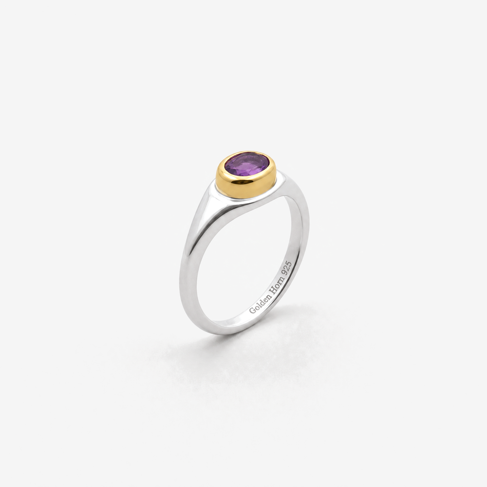 February Amethyst Birthstone Ring in sterling silver with gold bezel, three-quarter view - Golden Horn Jewellery