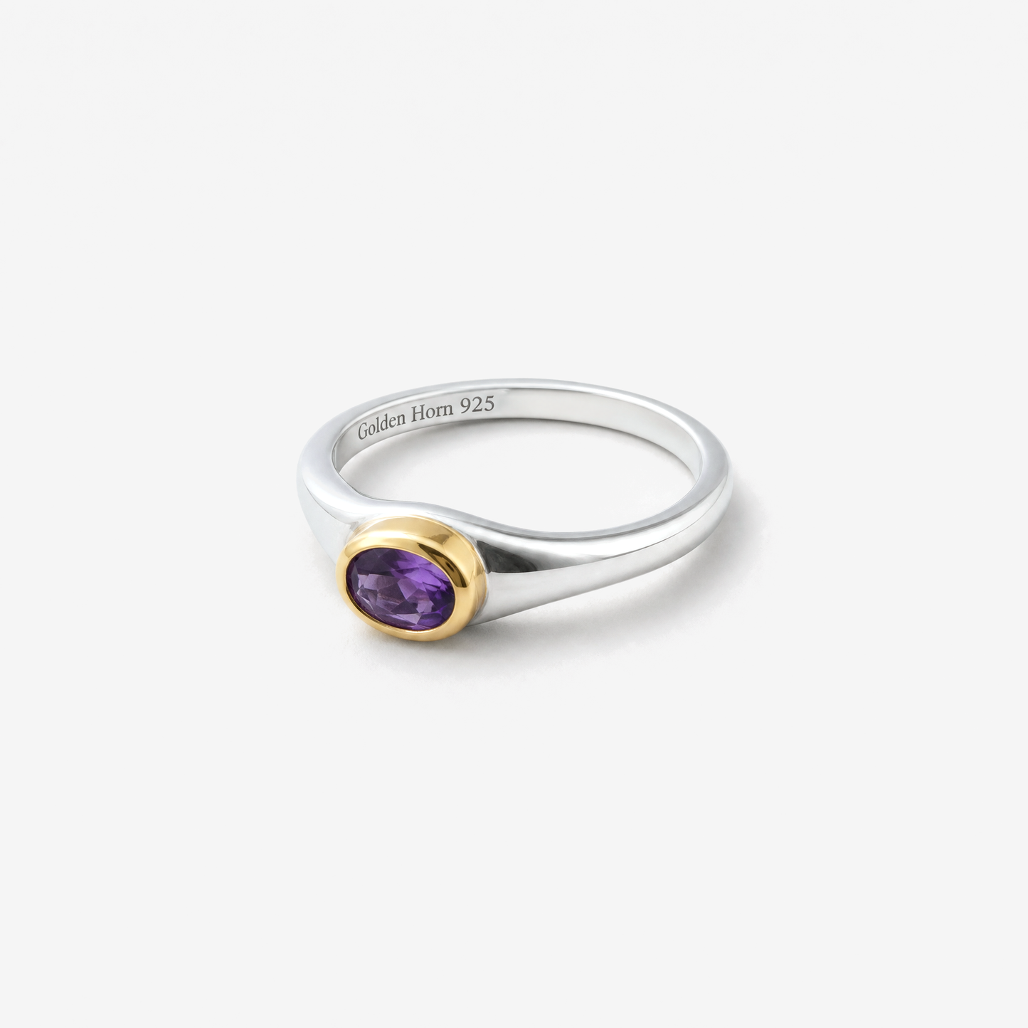 February Amethyst Birthstone Ring lying flat, amethyst in raised gold bezel - Golden Horn Jewellery