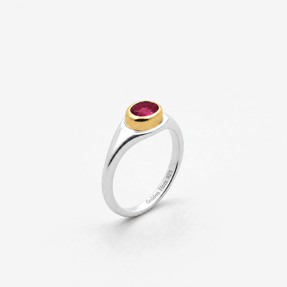 July Ruby Birthstone Ring in sterling silver with gold bezel, three-quarter view - Golden Horn Jewellery