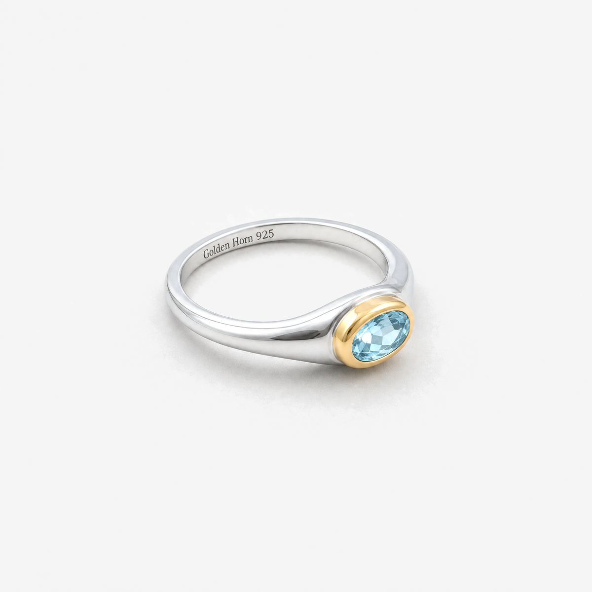 March Aquamarine Birthstone Ring lying flat, aquamarine in raised gold bezel - Golden Horn Jewellery
