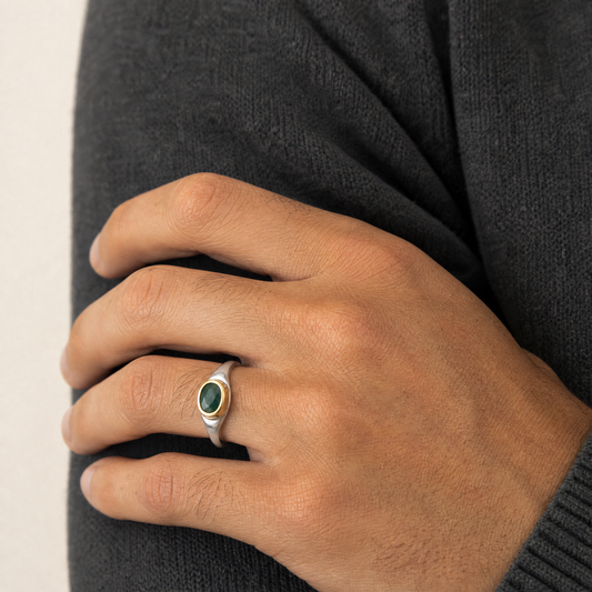 May Emerald Birthstone Ring close-up on hand, emerald in gold bezel - Golden Horn Jewellery