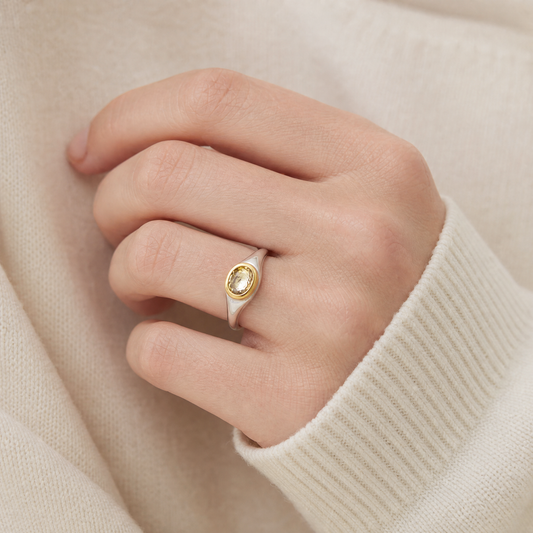 November Topaz Birthstone Ring close-up on hand, topaz in gold bezel - Golden Horn Jewellery
