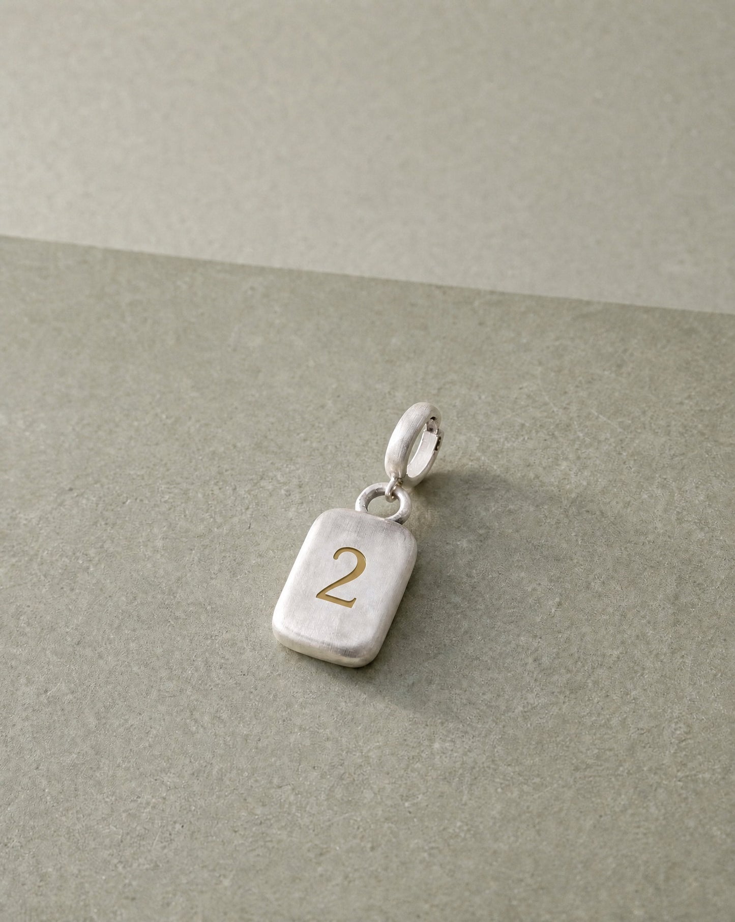 Number 2 Numerology Pendant still life – Golden Horn Jewellery