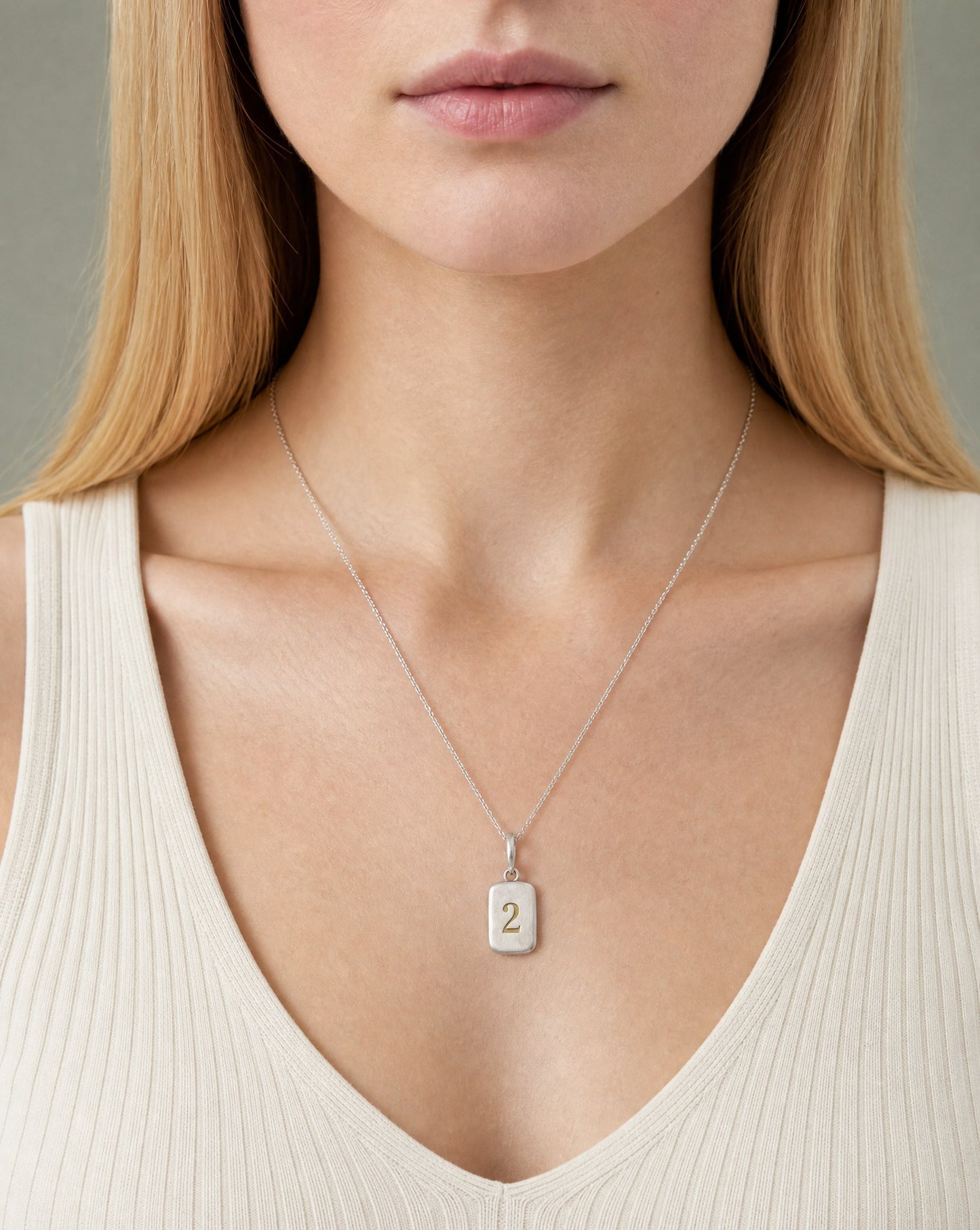 Number 2 Numerology Pendant worn, close-up – Golden Horn Jewellery