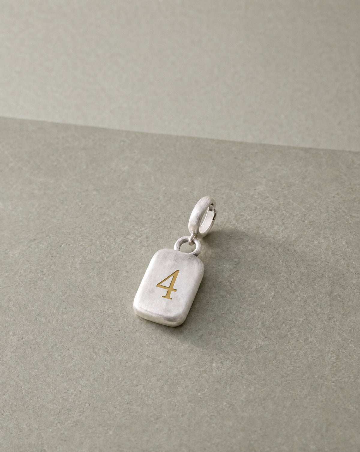 Number 4 Numerology Pendant still life – Golden Horn Jewellery