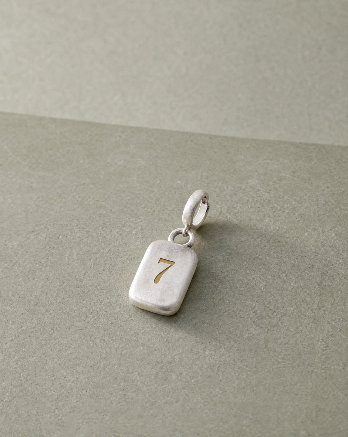 Number 7 Numerology Pendant still life – Golden Horn Jewellery