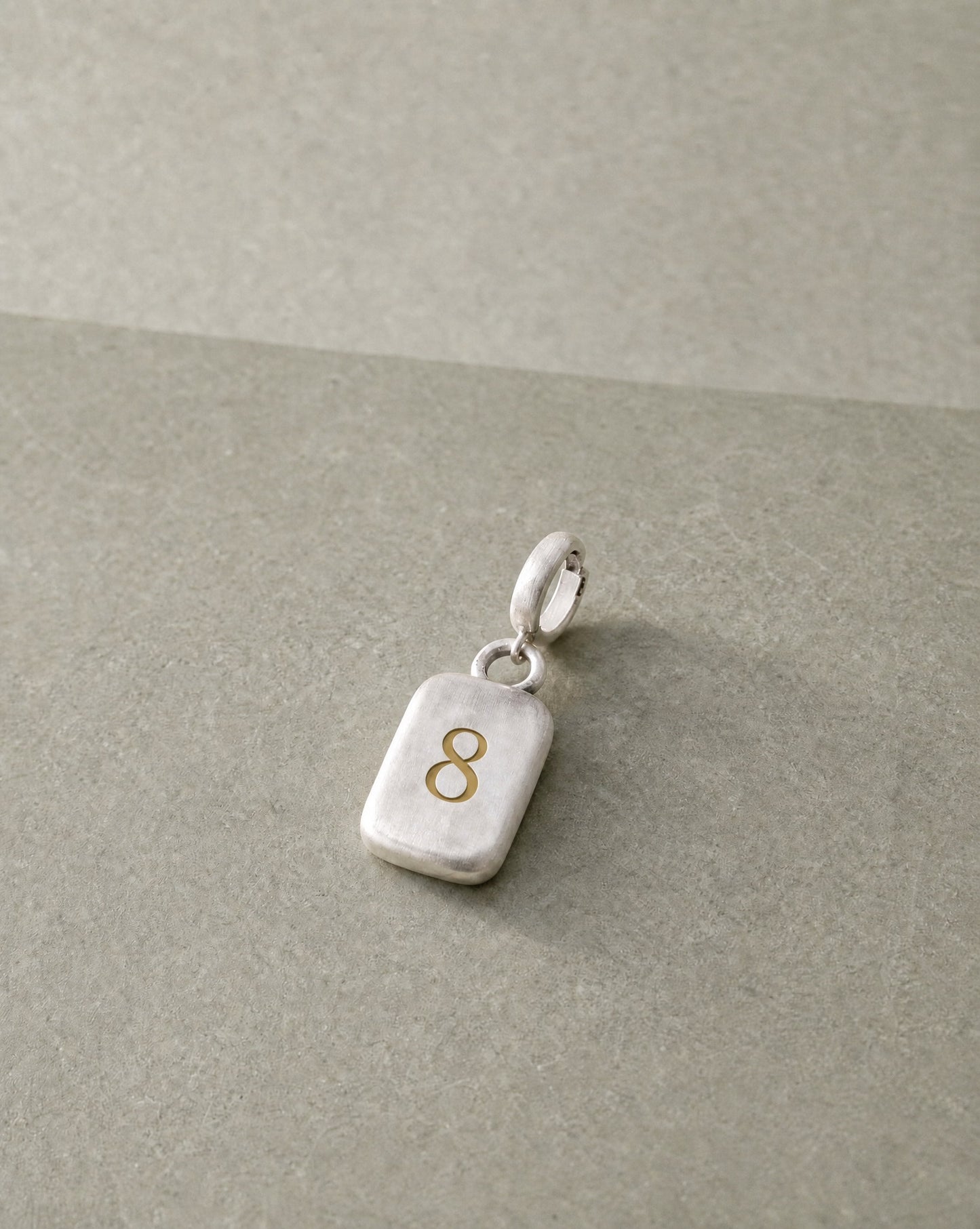 Number 8 Numerology Pendant still life – Golden Horn Jewellery