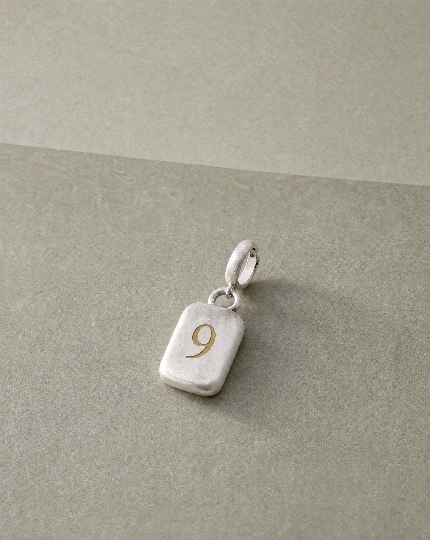 Number 9 Numerology Pendant still life – Golden Horn Jewellery