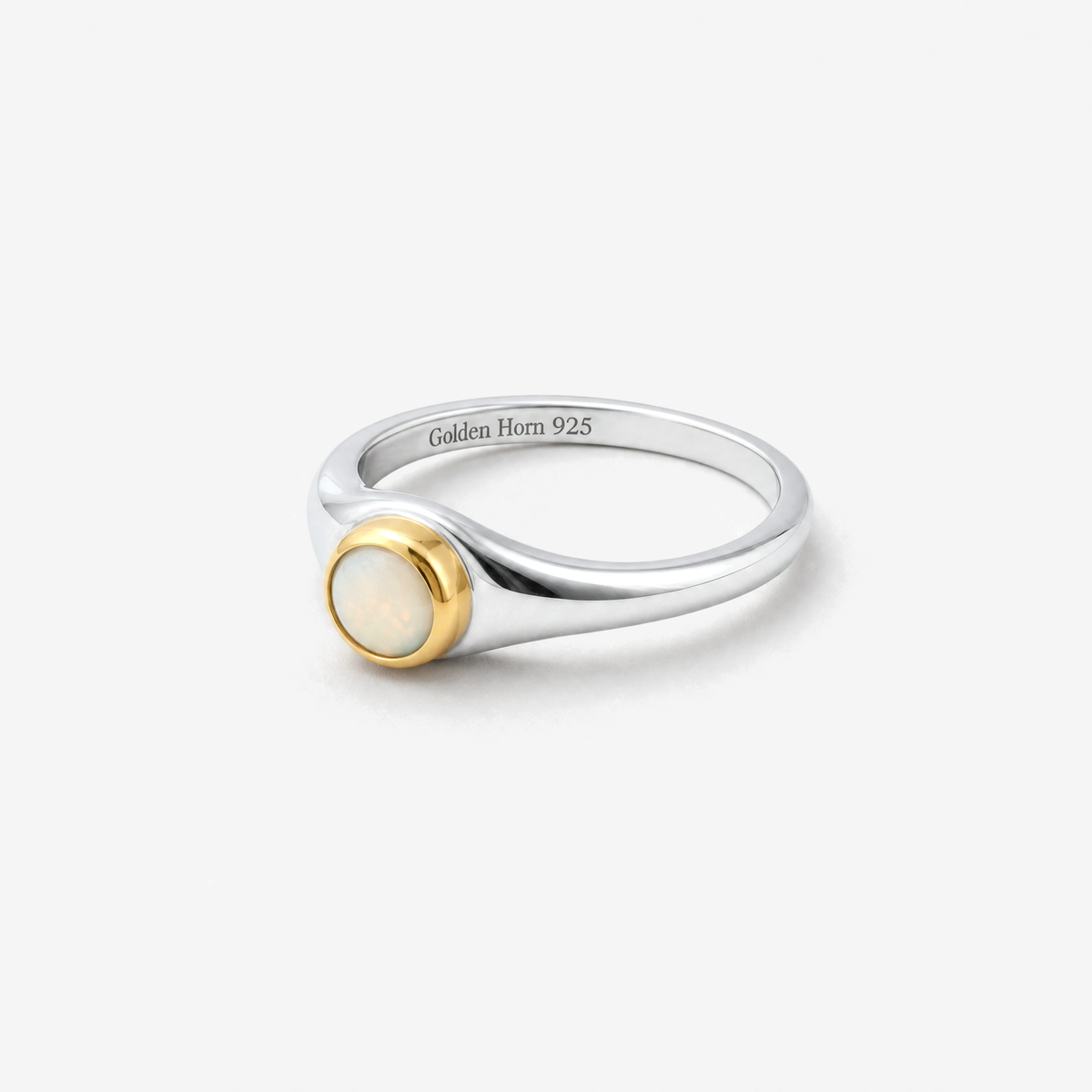 October Opal Birthstone Ring lying flat, opal cabochon in raised gold bezel - Golden Horn Jewellery