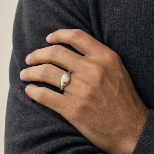 October Opal Birthstone Ring close-up on hand, opal cabochon in gold bezel - Golden Horn Jewellery