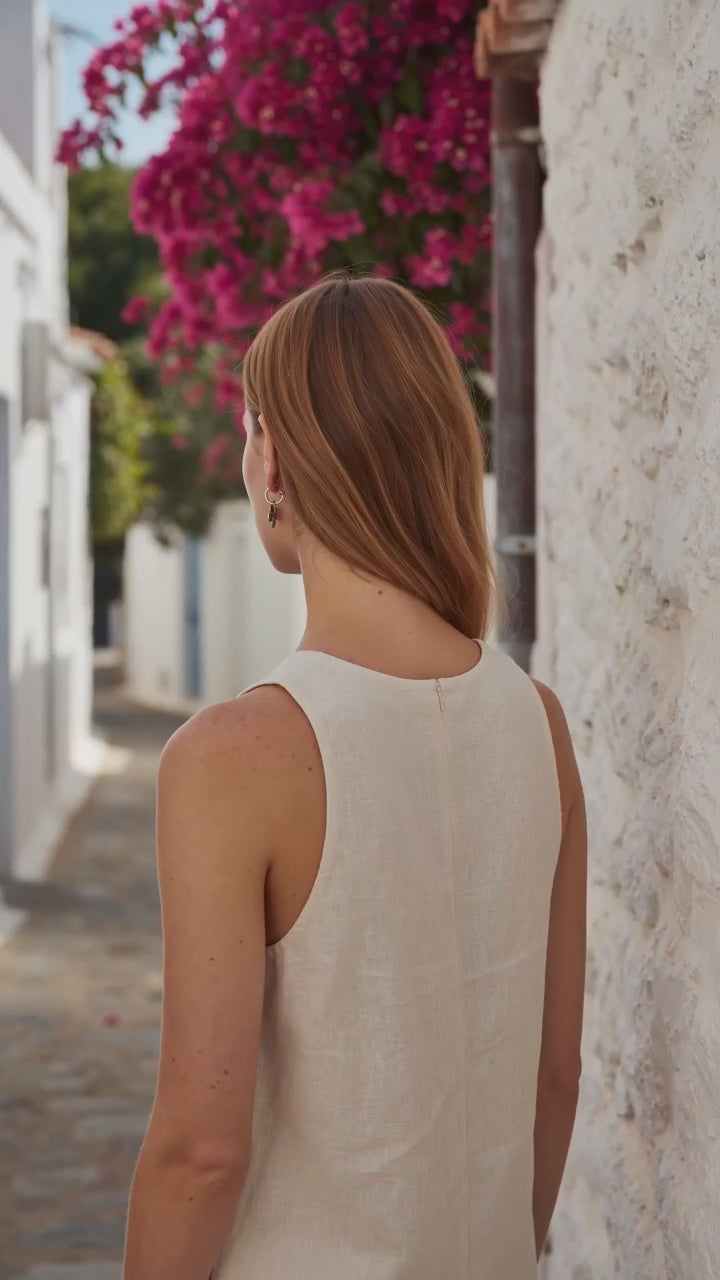 Spring Flower J Hoop Earrings worn by a model in an Aegean street