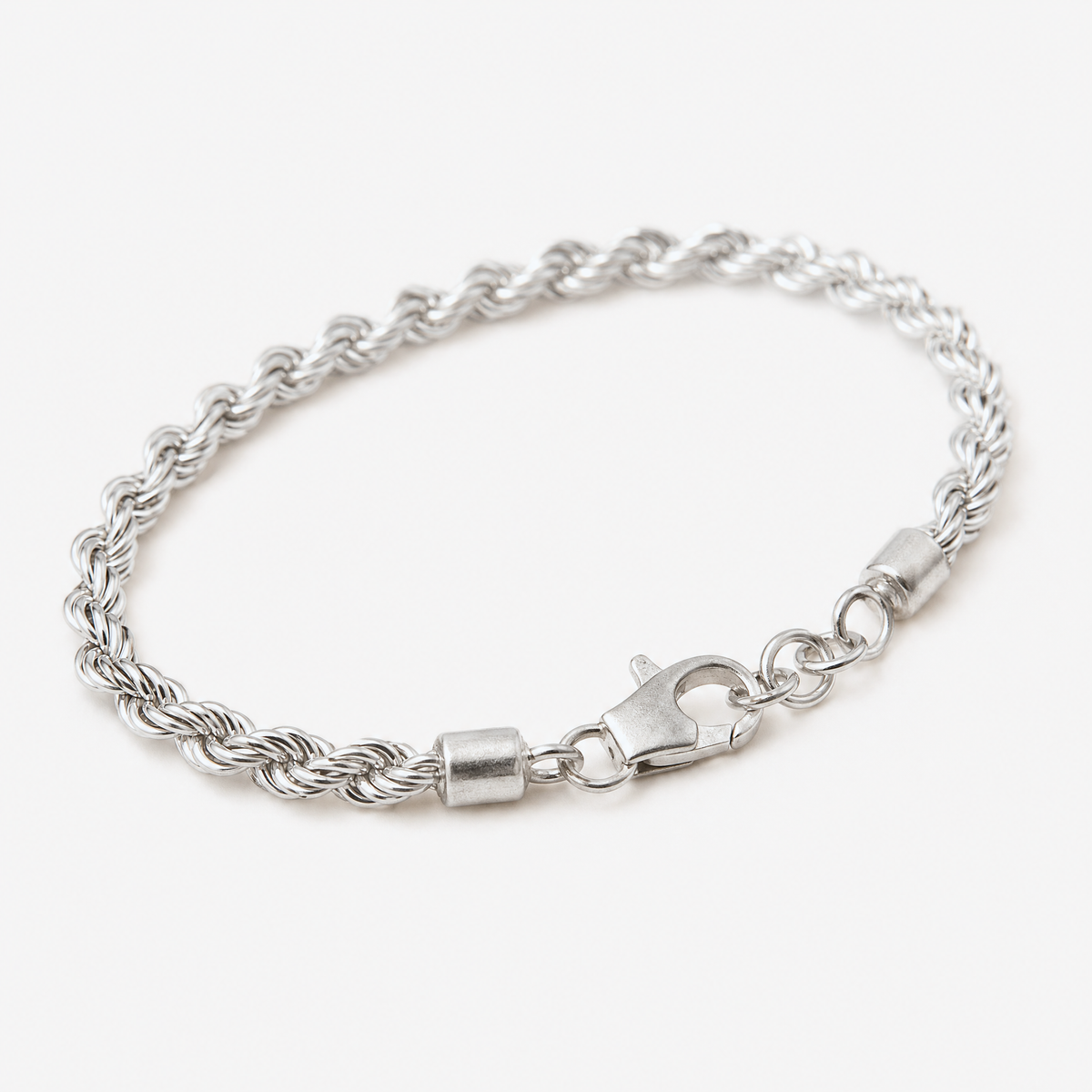 Macro detail of the twisted rope links and lobster clasp on the Silver Rope Chain Bracelet – Golden Horn Jewellery